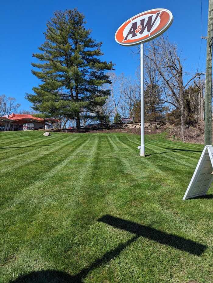 Professional lawn mowing with perfect stripes